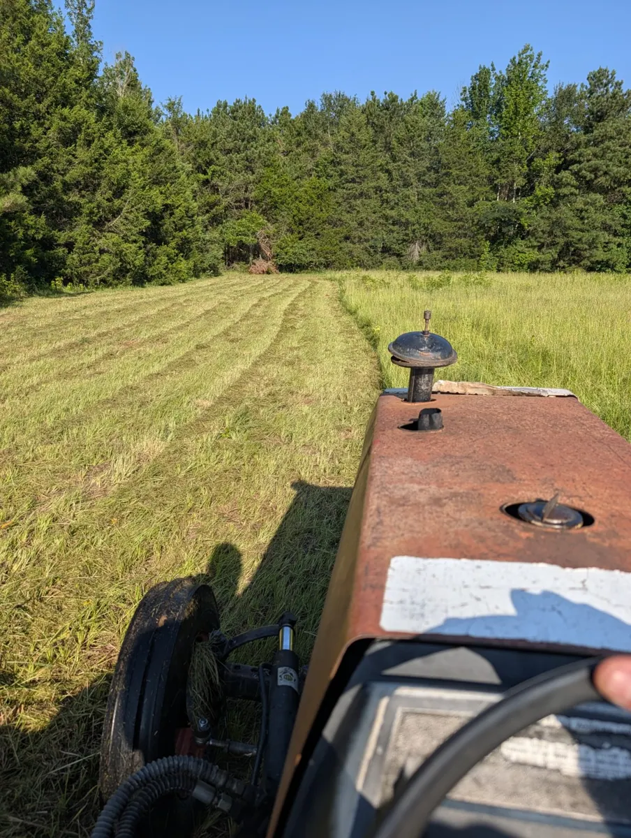 Field mowing in progress